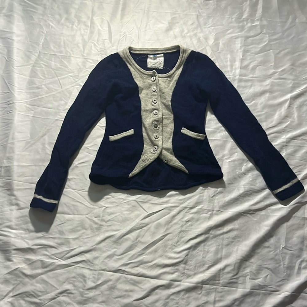 Sparrow cardigan in good condition. Blue with a white front.